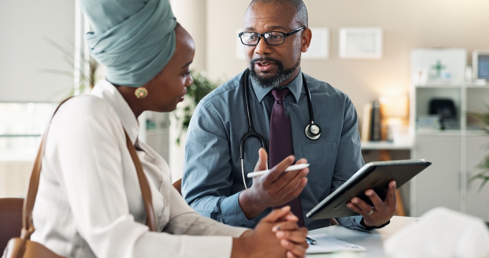 Conversation,,Healthcare,Or,Tablet,With,Doctor,And,Patient,In,Office